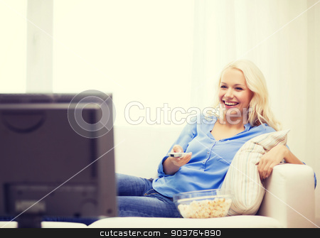 To use this stock image in your creative project, please select the size you need over to the right and click the "Add to Cart" button.
Your downloaded image will come with the Cutcaster watermark removed so don’t worry about the watermark you see on this page. young girl with popcorn watching movie at home stock photo, food, happiness and people concept - smiling young girl with popcorn watching movie at home by Syda Productions