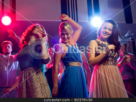 To use this stock image in your creative project, please select the size you need over to the right and click the "Add to Cart" button.
Your downloaded image will come with the Cutcaster watermark removed so don’t worry about the watermark you see on this page. smiling friends dancing in club stock photo, party, holidays, celebration, nightlife and people concept - smiling friends dancing in club by Syda Productions