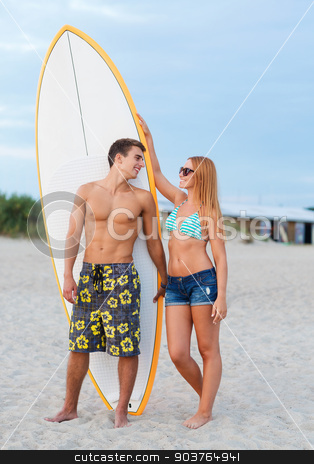 To use this stock image in your creative project, please select the size you need over to the right and click the "Add to Cart" button.
Your downloaded image will come with the Cutcaster watermark removed so don’t worry about the watermark you see on this page. smiling couple in sunglasses with surfs on beach stock photo, friendship, sea, summer vacation, water sport and people concept - smiling couple in swimwear and sunglasses with surfs on beach by Syda Productions