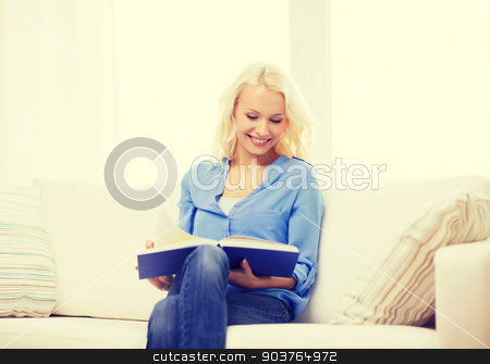 To use this stock image in your creative project, please select the size you need over to the right and click the "Add to Cart" button.
Your downloaded image will come with the Cutcaster watermark removed so don’t worry about the watermark you see on this page. smiling woman reading book and sitting on couch stock photo, leasure and home concept - smiling middle-aged woman reading book and sitting on couch at home by Syda Productions