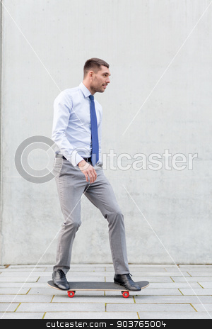 To use this stock image in your creative project, please select the size you need over to the right and click the "Add to Cart" button.
Your downloaded image will come with the Cutcaster watermark removed so don’t worry about the watermark you see on this page. young smiling businessman with skateboard outdoors stock photo, business, hot drinks and people and concept - young smiling businessman riding on skateboard outdoors by Syda Productions