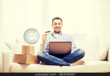 To use this stock image in your creative project, please select the size you need over to the right and click the "Add to Cart" button.
Your downloaded image will come with the Cutcaster watermark removed so don’t worry about the watermark you see on this page. man with laptop, credit card and cardboard boxes stock photo, technology, home and lifestyle concept - smiling man with laptop, credit card and cardboard boxes at home by Syda Productions