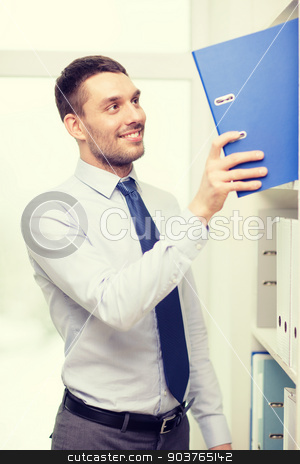 To use this stock image in your creative project, please select the size you need over to the right and click the "Add to Cart" button.
Your downloaded image will come with the Cutcaster watermark removed so don’t worry about the watermark you see on this page. handsome businessman picking folder at office stock photo, business and office concept - handsome businessman picking folder at office by Syda Productions
