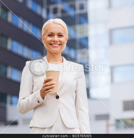To use this stock image in your creative project, please select the size you need over to the right and click the "Add to Cart" button.
Your downloaded image will come with the Cutcaster watermark removed so don’t worry about the watermark you see on this page. smiling businesswoman with paper cup outdoors stock photo, business, hot drinks and people and concept - young smiling businesswoman with paper coffee cup over office building by Syda Productions