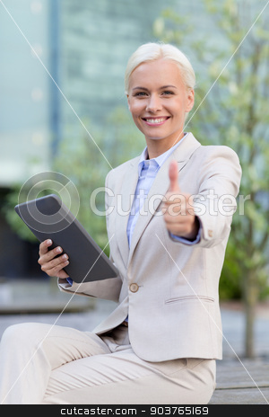 To use this stock image in your creative project, please select the size you need over to the right and click the "Add to Cart" button.
Your downloaded image will come with the Cutcaster watermark removed so don’t worry about the watermark you see on this page. smiling businesswoman with tablet pc outdoors stock photo, business, education, technology, gesture and people concept - smiling businesswoman working with tablet pc computer showing thumbs up on city street by Syda Productions