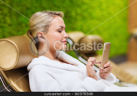 To use this stock image in your creative project, please select the size you need over to the right and click the "Add to Cart" button.
Your downloaded image will come with the Cutcaster watermark removed so don’t worry about the watermark you see on this page. beautiful young woman with smartphone at spa stock photo, people, beauty, lifestyle, technology and relaxation concept - beautiful young woman in white bath robe with smartphone social networking at spa by Syda Productions