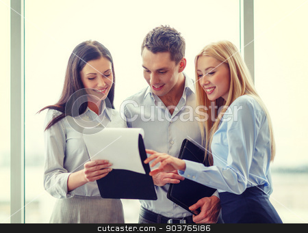 To use this stock image in your creative project, please select the size you need over to the right and click the "Add to Cart" button.
Your downloaded image will come with the Cutcaster watermark removed so don’t worry about the watermark you see on this page. business team looking at clipboard stock photo, business and office concept - smiling business team looking at clipboard by Syda Productions