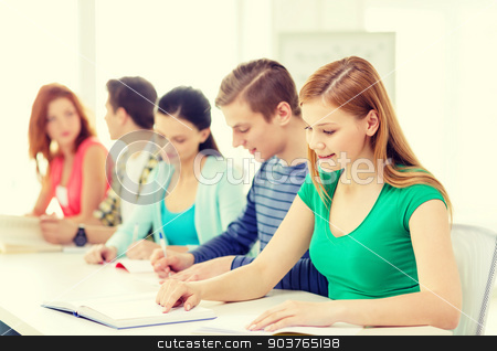 To use this stock image in your creative project, please select the size you need over to the right and click the "Add to Cart" button.
Your downloaded image will come with the Cutcaster watermark removed so don’t worry about the watermark you see on this page. students with textbooks and books at school stock photo, education and school concept - five smiling students with textbooks and books at school by Syda Productions