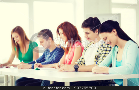 To use this stock image in your creative project, please select the size you need over to the right and click the "Add to Cart" button.
Your downloaded image will come with the Cutcaster watermark removed so don’t worry about the watermark you see on this page. smiling students with textbooks at school stock photo, education and school concept - five smiling students with textbooks at school by Syda Productions