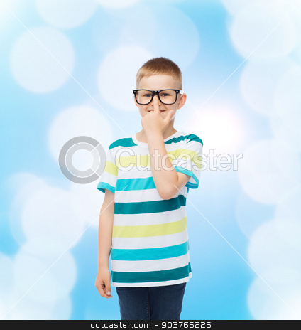 To use this stock image in your creative project, please select the size you need over to the right and click the "Add to Cart" button.
Your downloaded image will come with the Cutcaster watermark removed so don’t worry about the watermark you see on this page. smiling little boy in eyeglasses stock photo, vision, education and school concept - smiling little boy in eyeglasses over blue background by Syda Productions