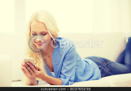 To use this stock image in your creative project, please select the size you need over to the right and click the "Add to Cart" button.
Your downloaded image will come with the Cutcaster watermark removed so don’t worry about the watermark you see on this page. smiling woman with smartphone at home stock photo, home, technology and internet concept - smiling woman with smartphone lying on couch at home by Syda Productions