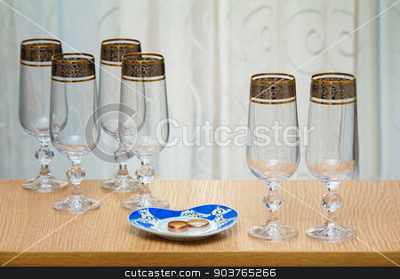 To use this stock image in your creative project, please select the size you need over to the right and click the "Add to Cart" button.
Your downloaded image will come with the Cutcaster watermark removed so don’t worry about the watermark you see on this page. Six beautiful glass of the glass. stock photo, On the table near the window there are six beautiful glass of wine. by Georgina198