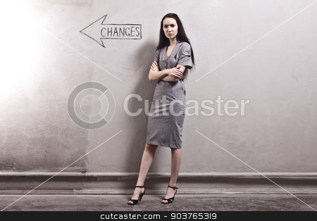To use this stock image in your creative project, please select the size you need over to the right and click the "Add to Cart" button.
Your downloaded image will come with the Cutcaster watermark removed so don’t worry about the watermark you see on this page. Changes stock photo, young girl against the old wall with graffiti. toned image. by Suchota