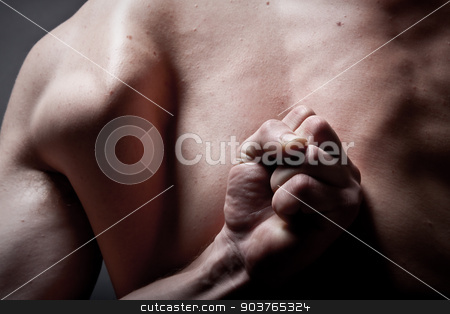 To use this stock image in your creative project, please select the size you need over to the right and click the "Add to Cart" button.
Your downloaded image will come with the Cutcaster watermark removed so don’t worry about the watermark you see on this page. working class stock photo, Strong man holding his fist behind his back by Suchota