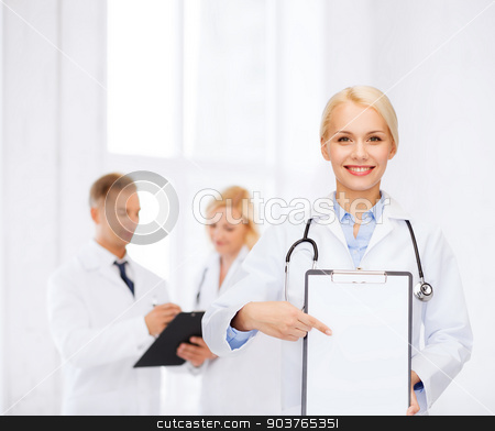 To use this stock image in your creative project, please select the size you need over to the right and click the "Add to Cart" button.
Your downloaded image will come with the Cutcaster watermark removed so don’t worry about the watermark you see on this page. smiling female doctor with clipboard stock photo, healthcare and medicine concept - smiling female doctor with stethoscope pointing finger to clipboard and blank page by Syda Productions