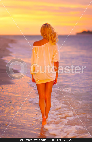 To use this stock image in your creative project, please select the size you need over to the right and click the "Add to Cart" button.
Your downloaded image will come with the Cutcaster watermark removed so don’t worry about the watermark you see on this page. Lady on sandy tropical beach at sunset. stock photo, Beautiful blonde lady relaxing and enjoying vacations on the sandy beach at sunset. Romantic tropical holidays. by kasto
