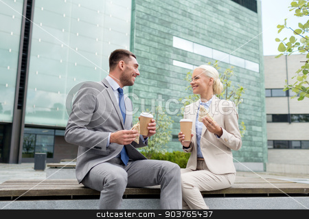 To use this stock image in your creative project, please select the size you need over to the right and click the "Add to Cart" button.
Your downloaded image will come with the Cutcaster watermark removed so don’t worry about the watermark you see on this page. smiling businessmen with paper cups outdoors stock photo, business, partnership, food, drinks and people concept - smiling businessmen with paper cups standing over office building by Syda Productions
