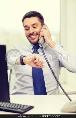 To use this stock image in your creative project, please select the size you need over to the right and click the "Add to Cart" button.
Your downloaded image will come with the Cutcaster watermark removed so don’t worry about the watermark you see on this page. smiling businessman making call stock photo, business, office and technology concept - smiling businessman making call and looking at wristwatch at office by Syda Productions