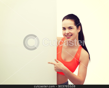 To use this stock image in your creative project, please select the size you need over to the right and click the "Add to Cart" button.
Your downloaded image will come with the Cutcaster watermark removed so don’t worry about the watermark you see on this page. teenage girl in sportswear with white board stock photo, fitness and diet concept - smiling teenage girl in sportswear pointing finger to white blank board by Syda Productions