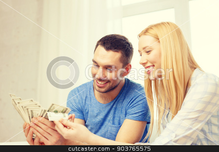 To use this stock image in your creative project, please select the size you need over to the right and click the "Add to Cart" button.
Your downloaded image will come with the Cutcaster watermark removed so don’t worry about the watermark you see on this page. couple with money at home stock photo, love, family, finance, money and happiness concpet - smiling couple with money at home by Syda Productions