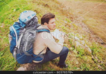 To use this stock image in your creative project, please select the size you need over to the right and click the "Add to Cart" button.
Your downloaded image will come with the Cutcaster watermark removed so don’t worry about the watermark you see on this page. man with backpack hiking stock photo, adventure, travel, tourism, hike and people concept - man with backpack sitting on ground from back by Syda Productions