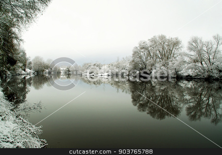 To use this stock image in your creative project, please select the size you need over to the right and click the "Add to Cart" button.
Your downloaded image will come with the Cutcaster watermark removed so don’t worry about the watermark you see on this page. Frozen lake in winter stock photo, Frozen lake in the woods after a snowfall winter by Piermichele Malucchi