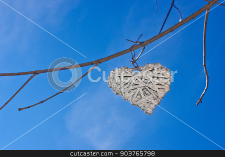 To use this stock image in your creative project, please select the size you need over to the right and click the "Add to Cart" button.
Your downloaded image will come with the Cutcaster watermark removed so don’t worry about the watermark you see on this page. Heart in the sky stock photo, A white heart in the blue sky hanging from a tree by Piermichele Malucchi