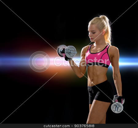 To use this stock image in your creative project, please select the size you need over to the right and click the "Add to Cart" button.
Your downloaded image will come with the Cutcaster watermark removed so don’t worry about the watermark you see on this page. sporty woman with heavy steel dumbbells stock photo, fitness, exercising and dieting concept - sporty woman with heavy steel dumbbells by Syda Productions