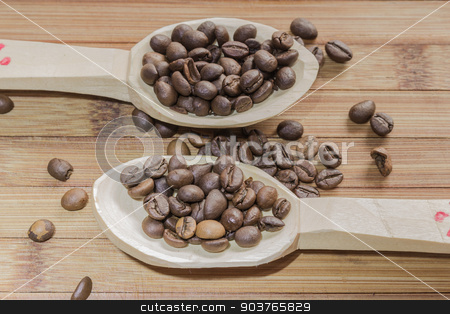 To use this stock image in your creative project, please select the size you need over to the right and click the "Add to Cart" button.
Your downloaded image will come with the Cutcaster watermark removed so don’t worry about the watermark you see on this page. Coffee beans stock photo, Coffee beans and two wooden spoon on wooden background by Robert Boss
