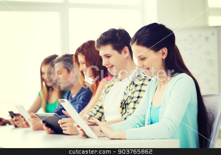 To use this stock image in your creative project, please select the size you need over to the right and click the "Add to Cart" button.
Your downloaded image will come with the Cutcaster watermark removed so don’t worry about the watermark you see on this page. smiling students with tablet pc at school stock photo, education, technology and internet concept - smiling students with tablet pc computers at school by Syda Productions