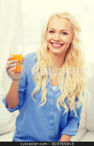 To use this stock image in your creative project, please select the size you need over to the right and click the "Add to Cart" button.
Your downloaded image will come with the Cutcaster watermark removed so don’t worry about the watermark you see on this page. smiling woman with glass of orange juice at home stock photo, healthcare, food, home and happiness concept - smiling young woman with glass of juice having breakfast at home by Syda Productions