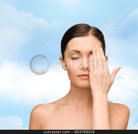 To use this stock image in your creative project, please select the size you need over to the right and click the "Add to Cart" button.
Your downloaded image will come with the Cutcaster watermark removed so don’t worry about the watermark you see on this page. smiling young woman covering face with hand stock photo, beauty, people and health concept - smiling young woman covering half of face with hand over blue sky background by Syda Productions
