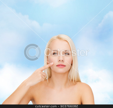 To use this stock image in your creative project, please select the size you need over to the right and click the "Add to Cart" button.
Your downloaded image will come with the Cutcaster watermark removed so don’t worry about the watermark you see on this page. calm young woman pointing at her cheek stock photo, health and beauty concept - face of beautiful young woman pointing at her cheek by Syda Productions