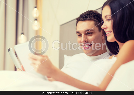 To use this stock image in your creative project, please select the size you need over to the right and click the "Add to Cart" button.
Your downloaded image will come with the Cutcaster watermark removed so don’t worry about the watermark you see on this page. smiling couple in bed with tablet pc computers stock photo, hotel, travel, relationships, technology, intermet and happiness concept - smiling couple in bed with tablet computers by Syda Productions