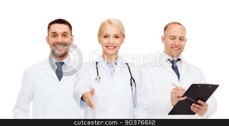 To use this stock image in your creative project, please select the size you need over to the right and click the "Add to Cart" button.
Your downloaded image will come with the Cutcaster watermark removed so don’t worry about the watermark you see on this page. group of doctors making handshake gesture stock photo, healthcare, people and medicine concept - group of doctors with stethoscope and clipboard making handshake gesture by Syda Productions