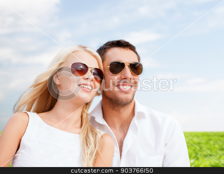 To use this stock image in your creative project, please select the size you need over to the right and click the "Add to Cart" button.
Your downloaded image will come with the Cutcaster watermark removed so don’t worry about the watermark you see on this page. happy couple in shades over natural background stock photo, summer holidays, people and dating concept - happy couple in shades over blue sky and grass background by Syda Productions