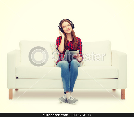 To use this stock image in your creative project, please select the size you need over to the right and click the "Add to Cart" button.
Your downloaded image will come with the Cutcaster watermark removed so don’t worry about the watermark you see on this page. girl sitting on sofa with headphones and tablet pc stock photo, home, leisure, technology and happiness concept - smiling teenage girl sitting on sofa with headphones and tablet pc computer by Syda Productions