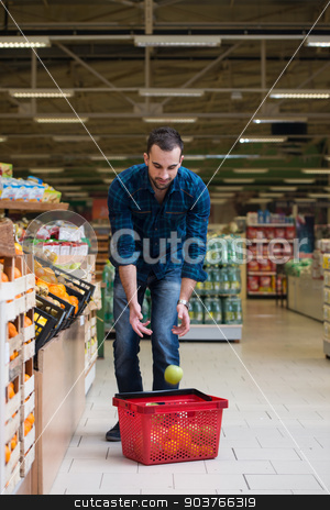 To use this stock image in your creative project, please select the size you need over to the right and click the "Add to Cart" button.
Your downloaded image will come with the Cutcaster watermark removed so don’t worry about the watermark you see on this page. Young Man Shopping In The Supermarket stock photo, Handsome Young Man Shopping For Fruits And Vegetables In Produce Department Of A Grocery Store - Supermarket - Shallow Deep Of Field by Jasminko Ibrakovic