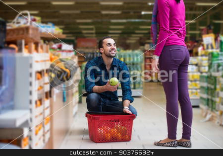 To use this stock image in your creative project, please select the size you need over to the right and click the "Add to Cart" button.
Your downloaded image will come with the Cutcaster watermark removed so don’t worry about the watermark you see on this page. Beautiful Young Couple Shopping In A Grocery Supermarket stock photo, Beautiful Young Couple Shopping For Fruits And Vegetables In Produce Department Of A Grocery Store - Supermarket - Shallow Deep Of Field by Jasminko Ibrakovic