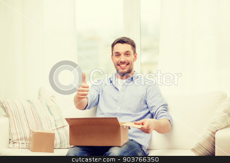 To use this stock image in your creative project, please select the size you need over to the right and click the "Add to Cart" button.
Your downloaded image will come with the Cutcaster watermark removed so don’t worry about the watermark you see on this page. man with cardboard boxes at home showing thumbs up stock photo, post, home and lifestyle concept - smiling man with cardboard boxes at home showing thumbs up by Syda Productions