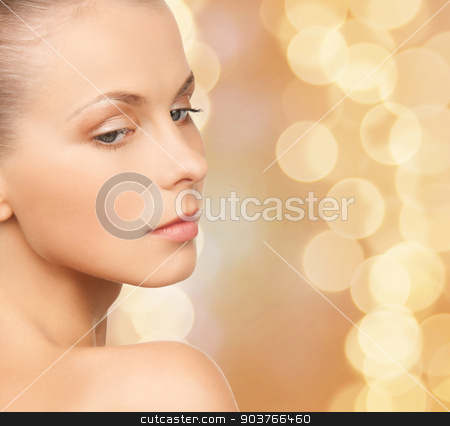 To use this stock image in your creative project, please select the size you need over to the right and click the "Add to Cart" button.
Your downloaded image will come with the Cutcaster watermark removed so don’t worry about the watermark you see on this page. beautiful young woman face stock photo, beauty, people and health concept - beautiful young woman face over beige lights background by Syda Productions