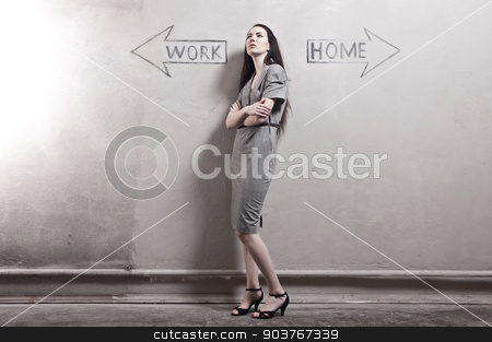 To use this stock image in your creative project, please select the size you need over to the right and click the "Add to Cart" button.
Your downloaded image will come with the Cutcaster watermark removed so don’t worry about the watermark you see on this page. Work - Home stock photo, young girl against the old wall with graffiti. toned image. by Suchota