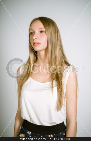 To use this stock image in your creative project, please select the size you need over to the right and click the "Add to Cart" button.
Your downloaded image will come with the Cutcaster watermark removed so don’t worry about the watermark you see on this page. real teenage girl stock photo, Portrait of a real young woman on a white background in a white shirt. Shallow depth of field. Focus on the eyelashes. by Suchota