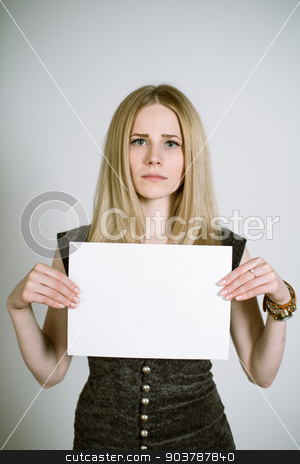 To use this stock image in your creative project, please select the size you need over to the right and click the "Add to Cart" button.
Your downloaded image will come with the Cutcaster watermark removed so don’t worry about the watermark you see on this page. blank paper stock photo, Portrait of a real young blonde woman on a light background in a black dress with a blank paper in her hands. Shallow depth of field. Focus on the eyelashes. by Suchota
