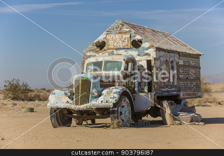 To use this stock image in your creative project, please select the size you need over to the right and click the "Add to Cart" button.
Your downloaded image will come with the Cutcaster watermark removed so don’t worry about the watermark you see on this page. Bible Truck Outsider Art Installation stock photo, CALIPATRIA, IMPERIAL COUNTY, CALIFORNIA, USA - NOVEMBER 28: Bible truck outsider art installation at Salvation Mountain on November 28, 2014 in at Calipatria, California, USA. by Scott Griessel
