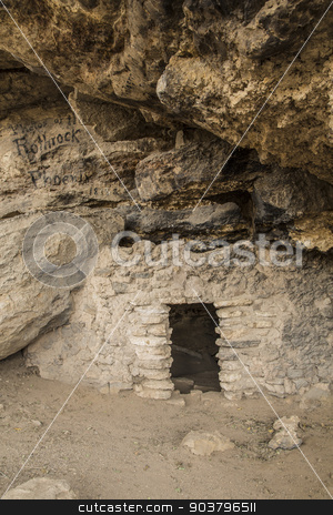 To use this stock image in your creative project, please select the size you need over to the right and click the "Add to Cart" button.
Your downloaded image will come with the Cutcaster watermark removed so don’t worry about the watermark you see on this page. Cliff Dwelling with Historic Graffiti stock photo, Cliff dwelling with historic paint graffiti advertisement by Scott Griessel