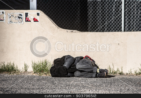 To use this stock image in your creative project, please select the size you need over to the right and click the "Add to Cart" button.
Your downloaded image will come with the Cutcaster watermark removed so don’t worry about the watermark you see on this page. Homeless Person Sleeping stock photo, Homeless person sleeping near wall in parking lot by Scott Griessel