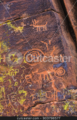 To use this stock image in your creative project, please select the size you need over to the right and click the "Add to Cart" button.
Your downloaded image will come with the Cutcaster watermark removed so don’t worry about the watermark you see on this page. Close Up Petroglyph Panel stock photo, Close up of North American petroglyph panel etched on stone by Scott Griessel