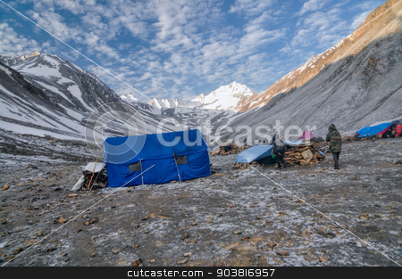 To use this stock image in your creative project, please select the size you need over to the right and click the "Add to Cart" button.
Your downloaded image will come with the Cutcaster watermark removed so don’t worry about the watermark you see on this page. Base camp in Himalayas stock photo, High altitude base camp in Himalayas mountains in Nepal by Michal Knitl