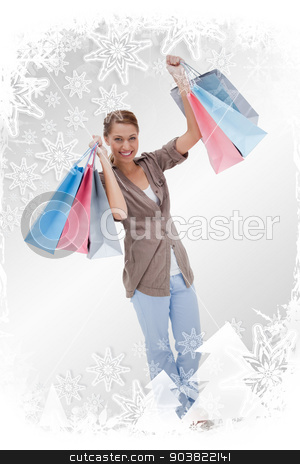 To use this stock image in your creative project, please select the size you need over to the right and click the "Add to Cart" button.
Your downloaded image will come with the Cutcaster watermark removed so don’t worry about the watermark you see on this page. Composite image of happy woman with her shopping bags stock photo, Happy woman with her shopping bags against christmas frame by Wavebreak Media